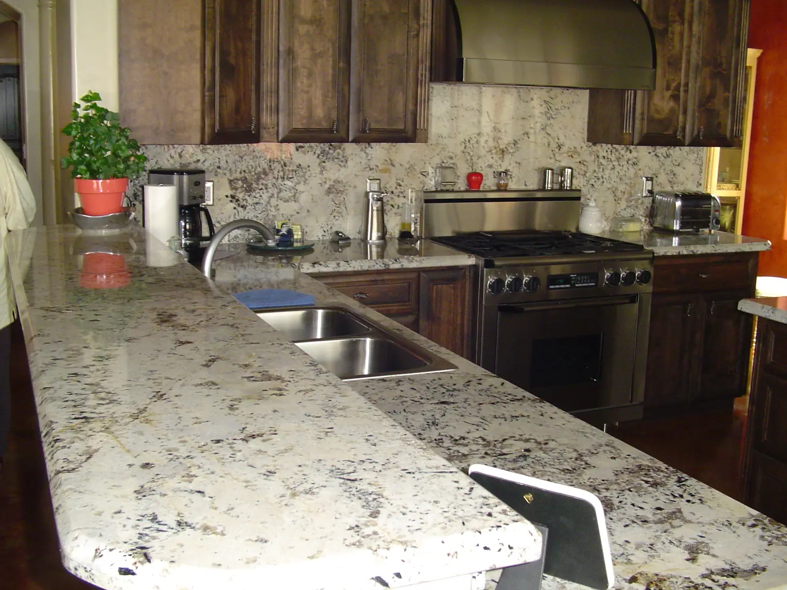 Polished white granite kitchen countertop close-up